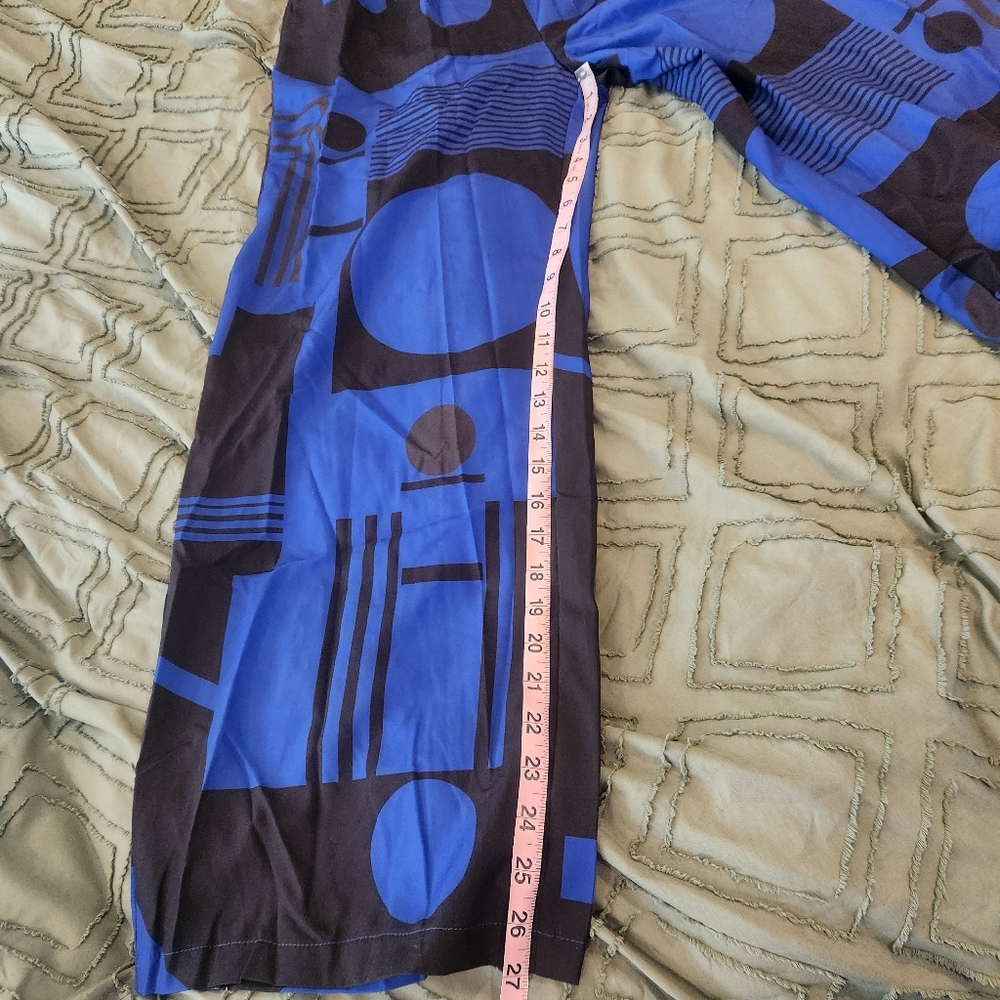 Nice Fashion blue and black jumpsuit. Patterns have circles and stripes. - Picture 3 of 10